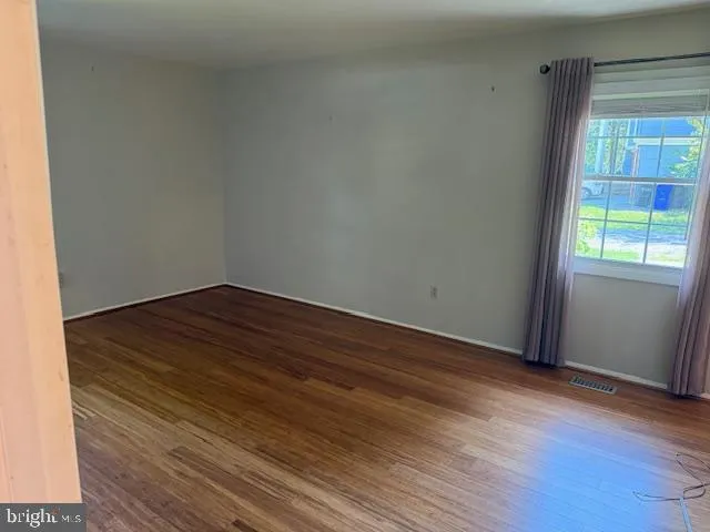a bathroom with a shower and a toilet