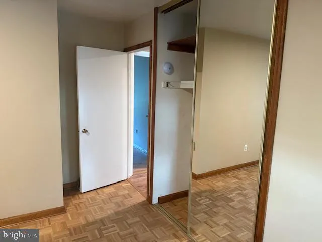 a view of a back yard from a balcony