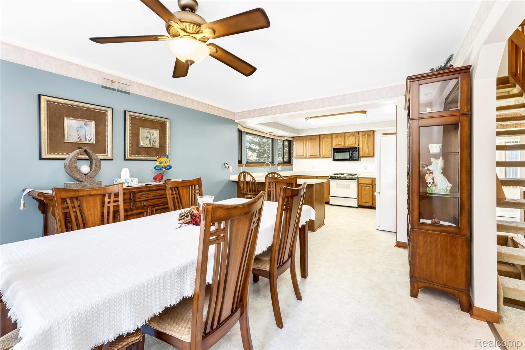 21565 Hall Road Trenton, MI 48183 - Photo 8 of 42 KITCHEN OPENS TO LARGE DINING AREA
