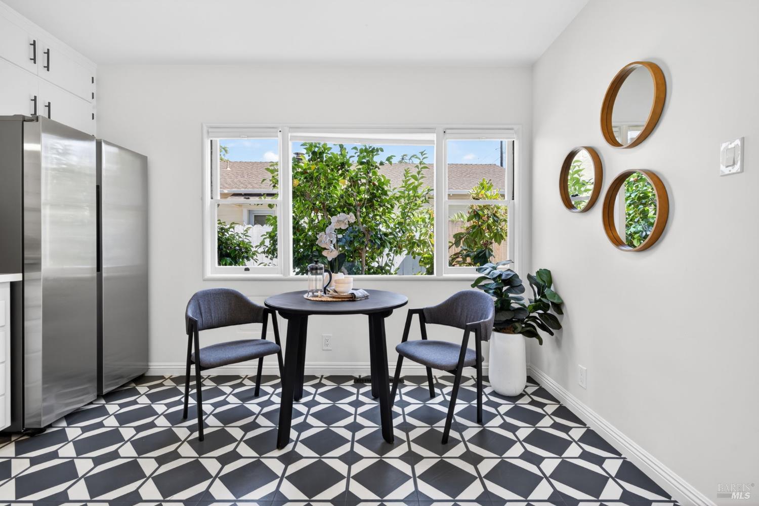 2211 Humboldt Street Santa Rosa, CA 95404 - Photo 20 of 52 a view of a dining room with furniture window and outside view