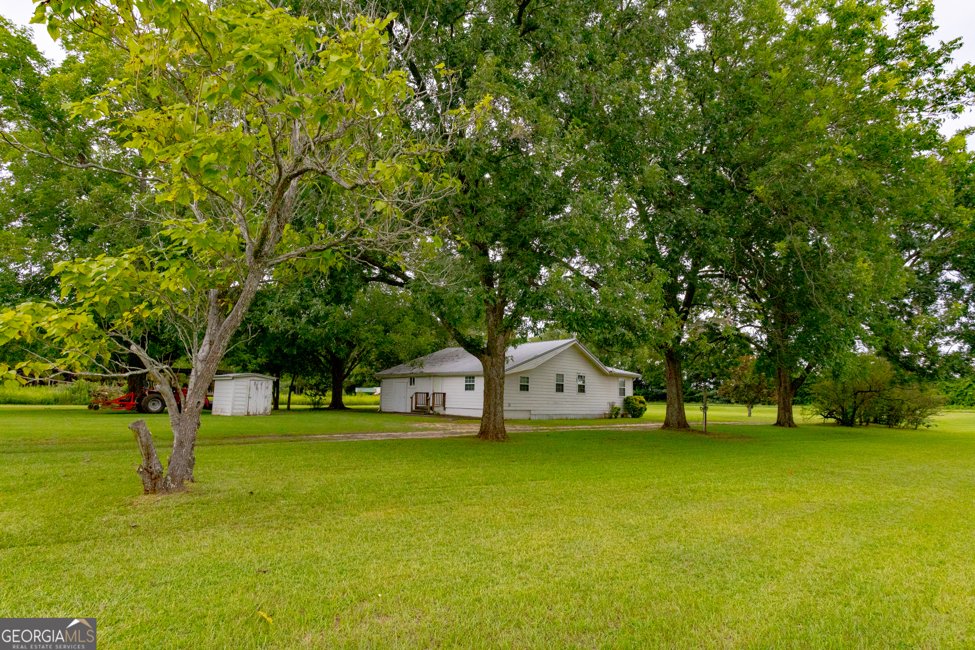 3176 East Centerpoint Road Preston, GA 31824 - Photo 2 of 44 a view of swimming pool with table and chairs