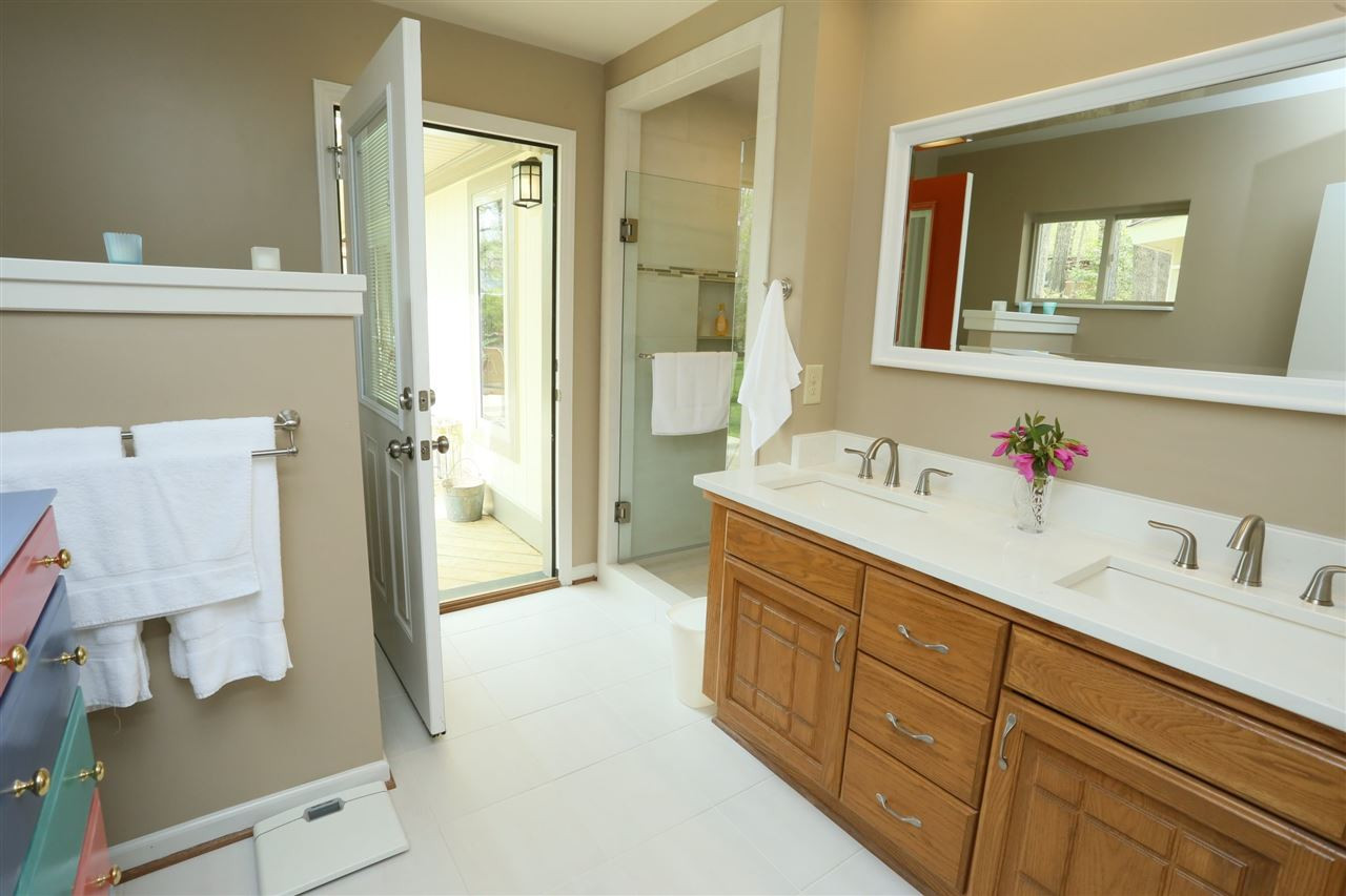 2117 Windy Woods Drive Raleigh, NC 27607 - Photo 18 of 30 Master Bath with Door to Deck & Gazebo