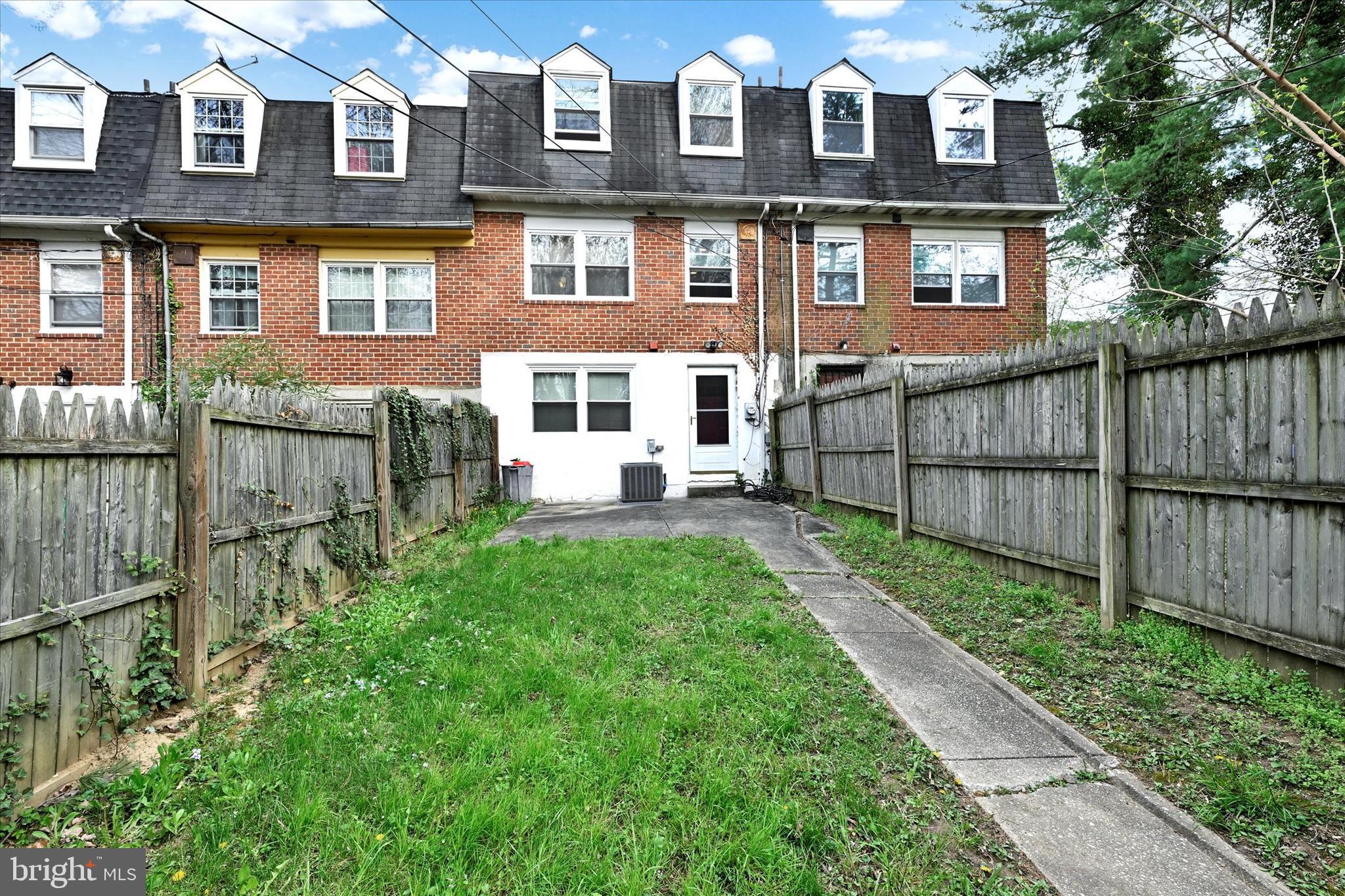 6402 Falkirk Road Baltimore, MD 21239 - Photo 25 of 28 Rear Yard w/ wood privacy fencing