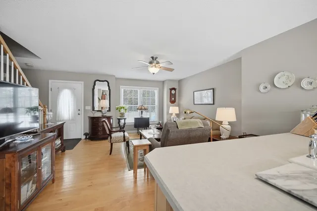 a bed room with bed and a large window