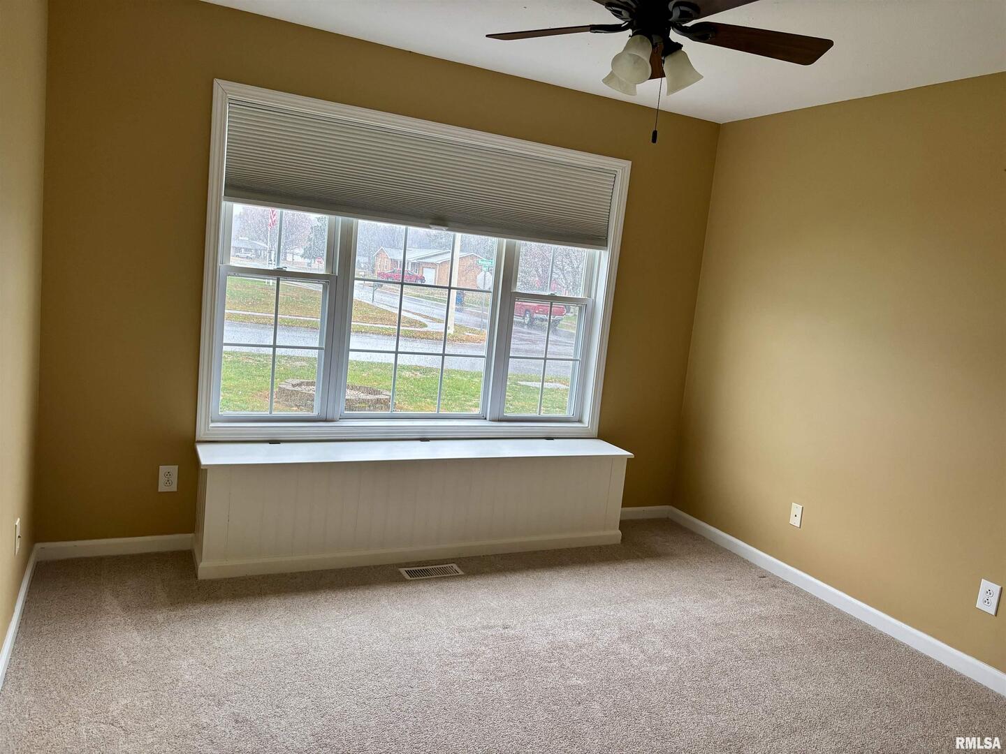 4232 Woodglen Lane Mount Vernon, IL 62864 - Photo 30 of 40 a living room with a bed and a window
