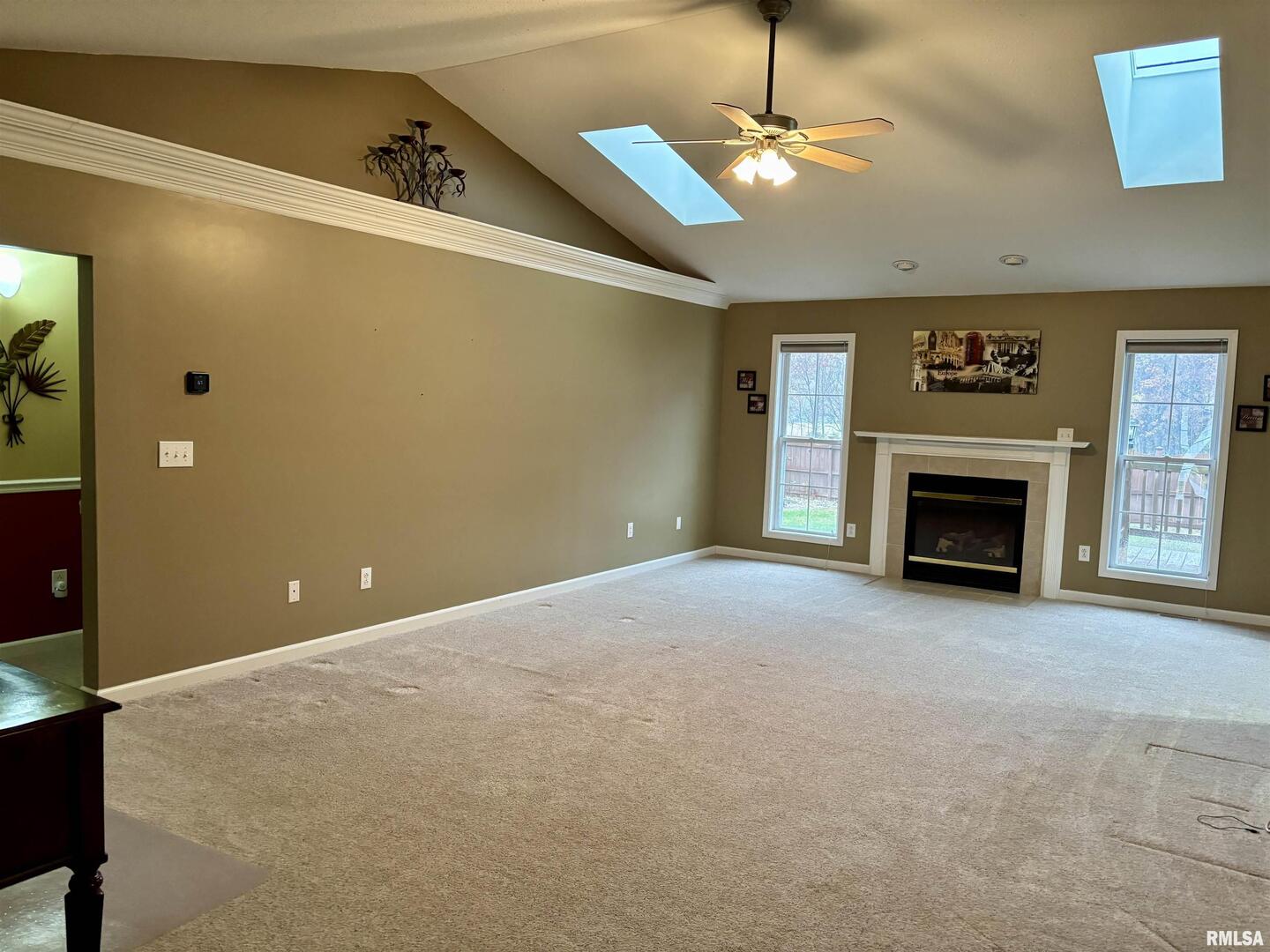 4232 Woodglen Lane Mount Vernon, IL 62864 - Photo 3 of 40 a view of a livingroom with an empty space and a fireplace