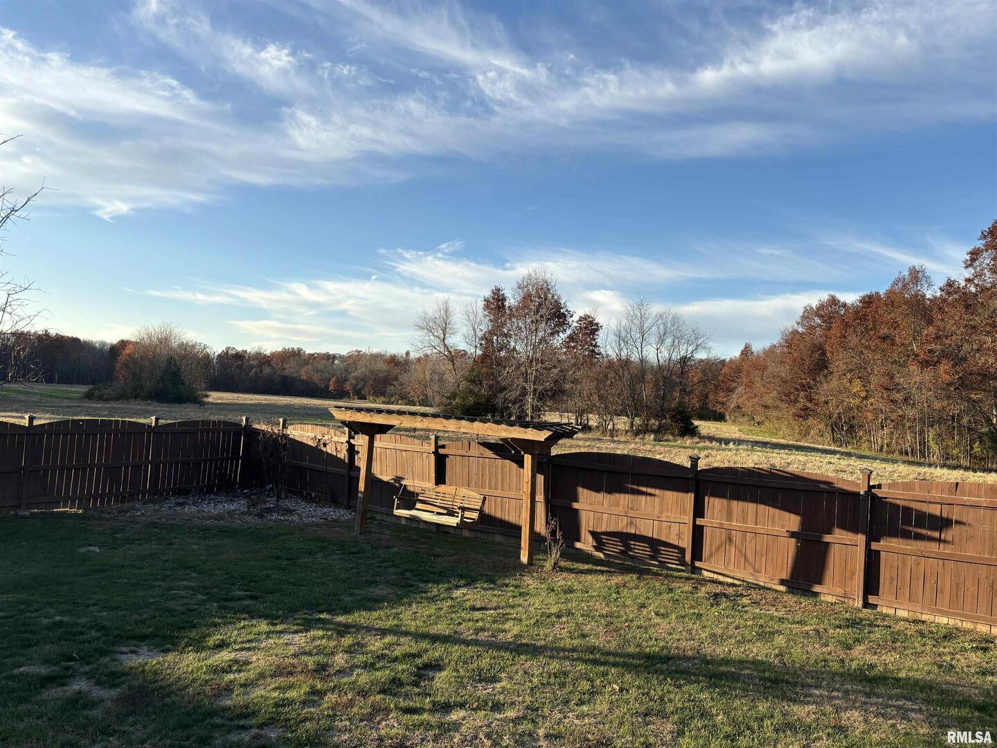 4232 Woodglen Lane Mount Vernon, IL 62864 - Photo 34 of 40 a view of a lake with a yard