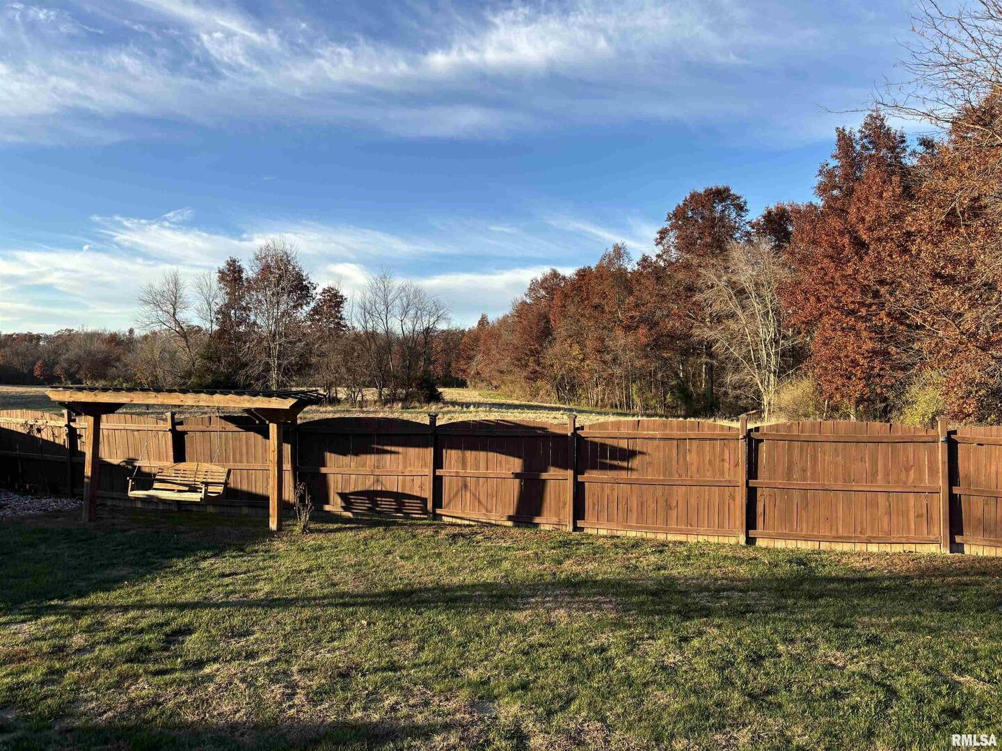 4232 Woodglen Lane Mount Vernon, IL 62864 - Photo 35 of 40 a view of a yard with wooden fence