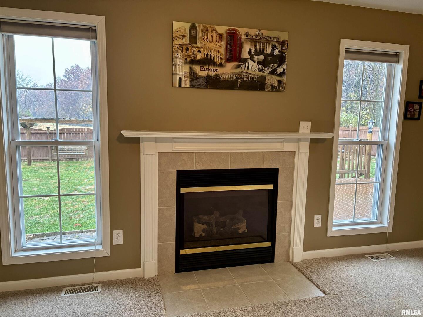 4232 Woodglen Lane Mount Vernon, IL 62864 - Photo 5 of 40 a living room with a fireplace