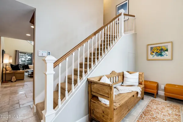 a kitchen with stainless steel appliances granite countertop wooden cabinets a sink and a stove