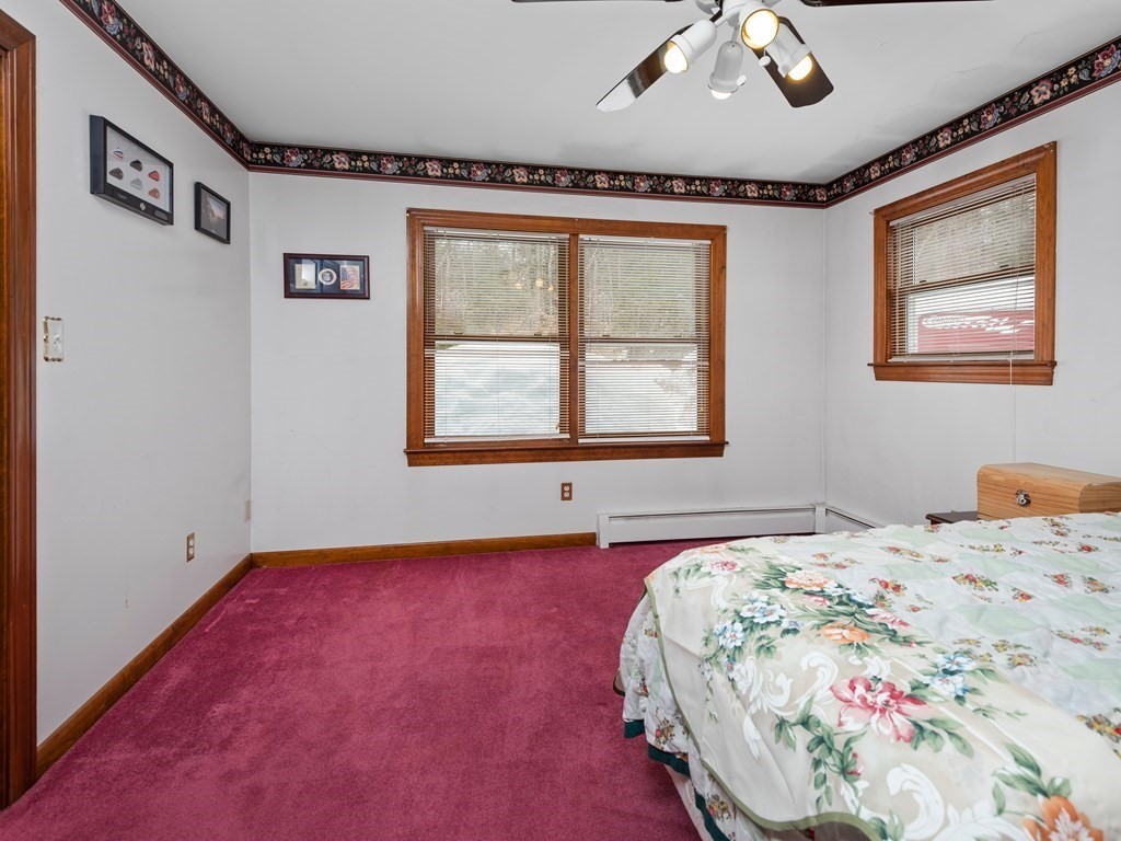 18 Gray Road Templeton, MA 01468 - Photo 21 of 38 a bedroom with a bed and a window