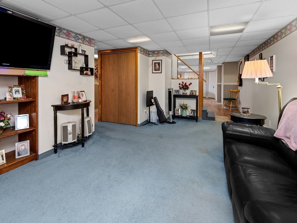 18 Gray Road Templeton, MA 01468 - Photo 29 of 38 a view of a livingroom with furniture and a flat screen tv