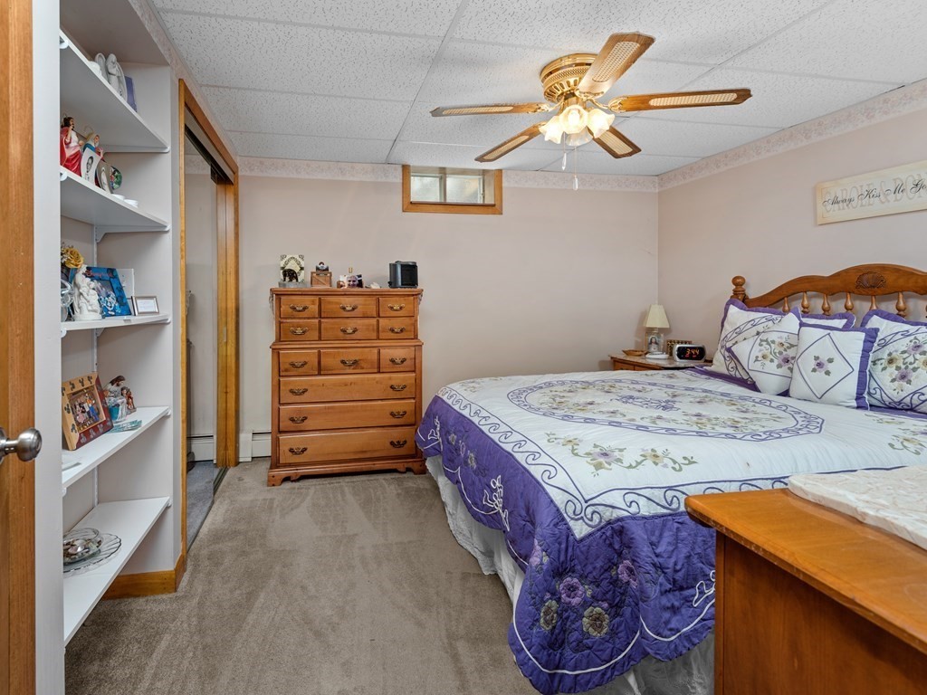 18 Gray Road Templeton, MA 01468 - Photo 30 of 38 a bedroom with a bed and a closet