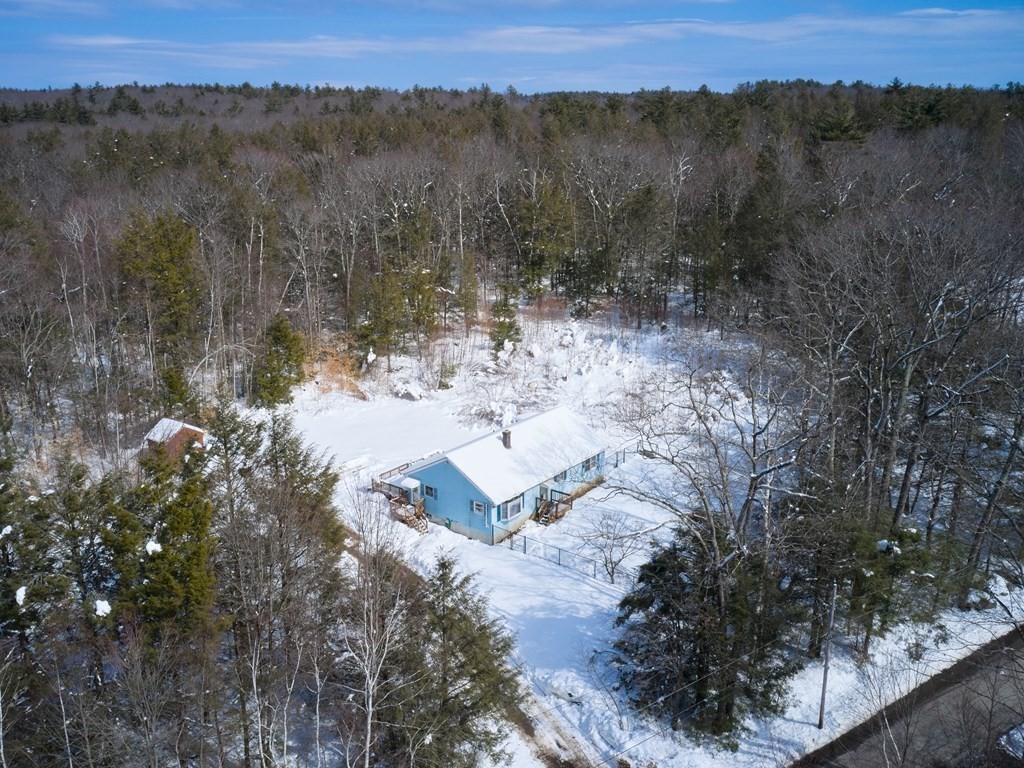 18 Gray Road Templeton, MA 01468 - Photo 3 of 38 a view of a lake with a mountain in the background