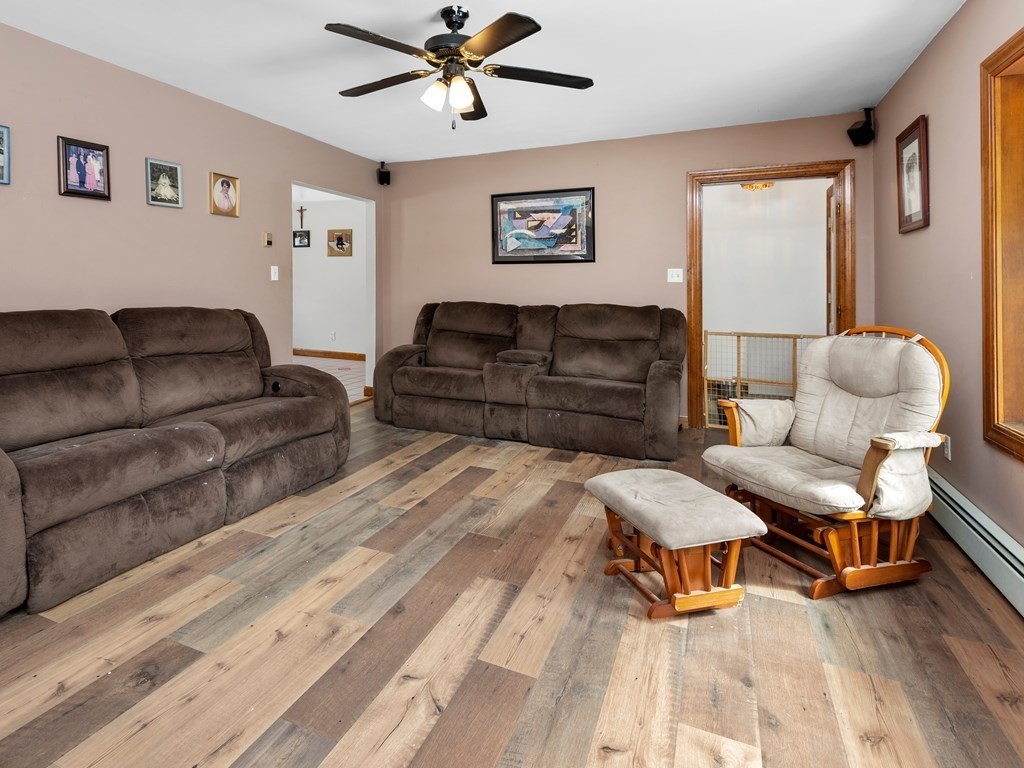18 Gray Road Templeton, MA 01468 - Photo 5 of 38 a living room with furniture and a wooden floor