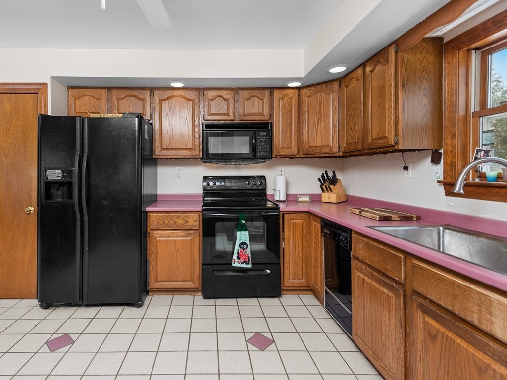 18 Gray Road Templeton, MA 01468 - Photo 7 of 38 a kitchen with stainless steel appliances granite countertop a refrigerator stove and sink