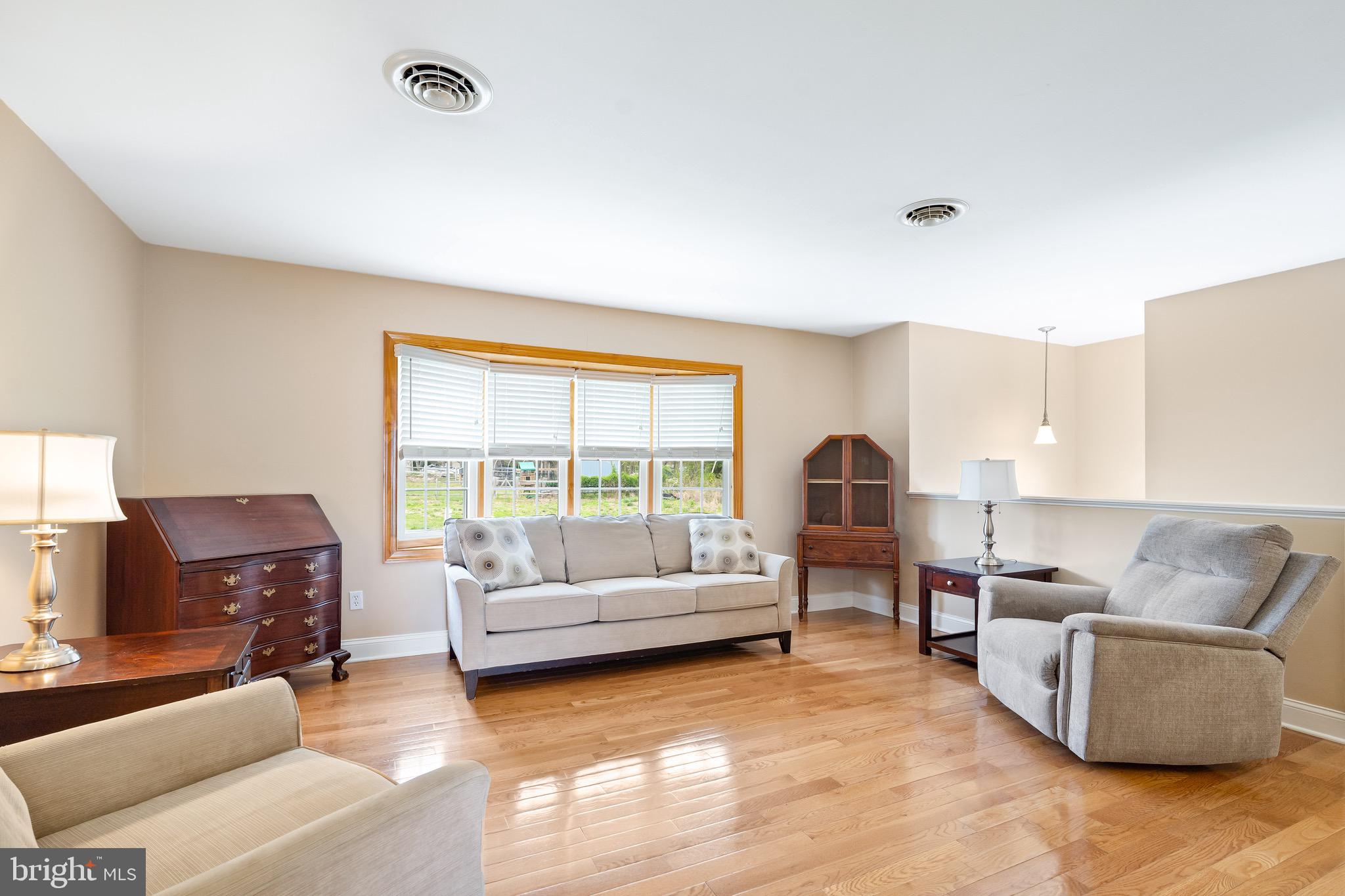 7 Weed Lane Elkton, MD 21921 - Photo 11 of 34 a living room with furniture and a large window