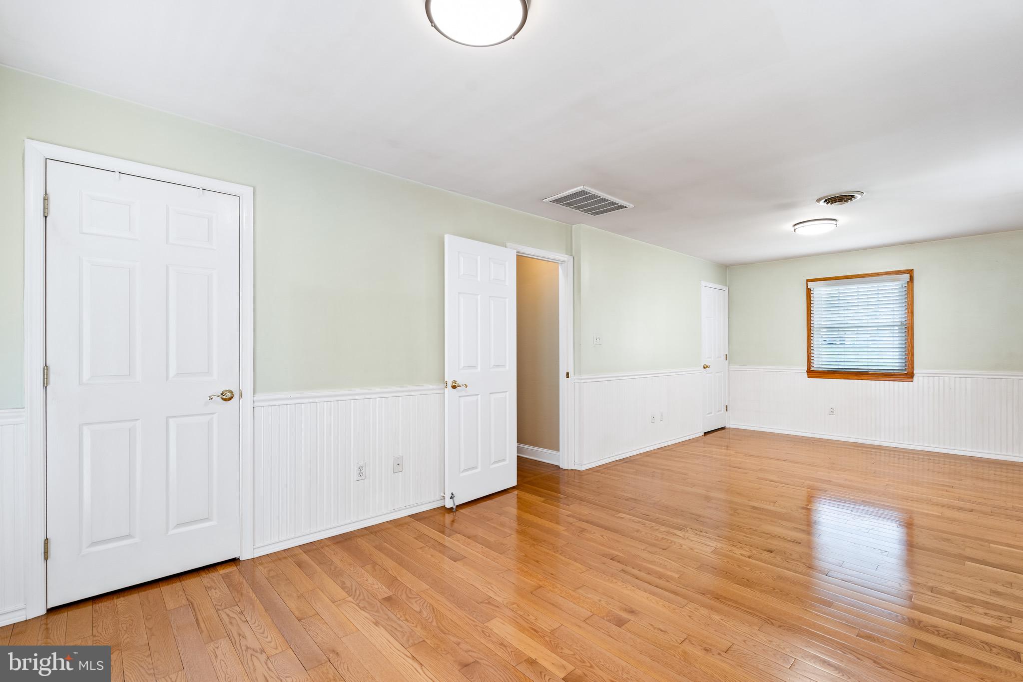 7 Weed Lane Elkton, MD 21921 - Photo 17 of 34 a view of an empty room with wooden floor and closet