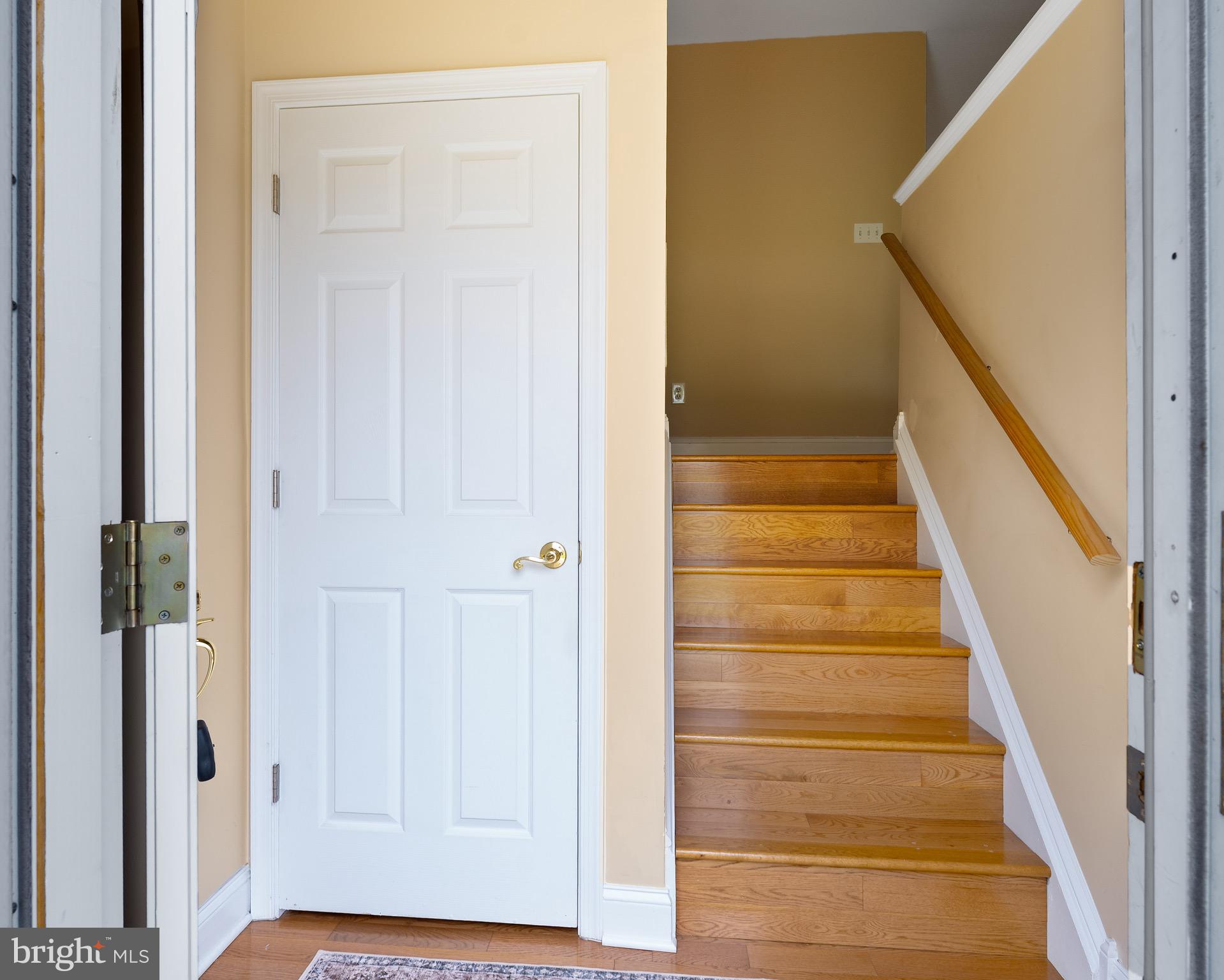 7 Weed Lane Elkton, MD 21921 - Photo 5 of 34 a view of staircase with white walls and white door