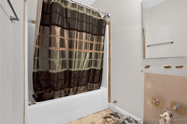 a view of staircase with white walls