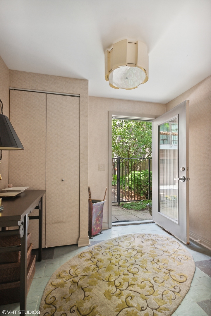 2751 North Greenview Avenue, Unit F Chicago, IL 60614 - Photo 26 of 29 a bedroom with a bed and a window