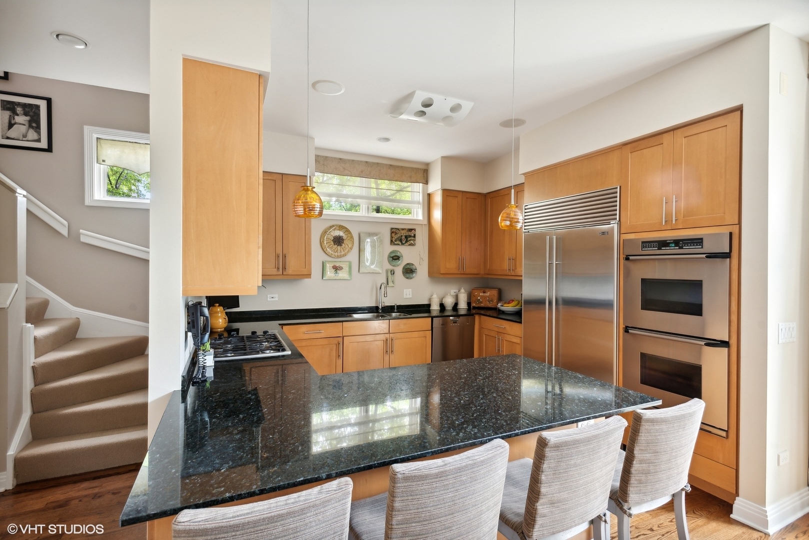 2751 North Greenview Avenue, Unit F Chicago, IL 60614 - Photo 7 of 29 a kitchen with stainless steel appliances granite countertop a sink and a refrigerator