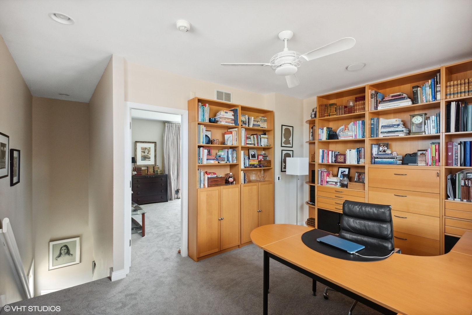 2751 North Greenview Avenue, Unit F Chicago, IL 60614 - Photo 9 of 29 a living room with furniture and a book shelf