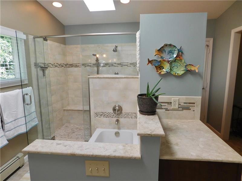 935 Ruth Street Pittsburgh, PA 15243 - Photo 11 of 25 A beach vacation was the inspiration behind this renovation. A vaulted ceiling, skylights, sand colored mixed materials, and softly colored walls will make this a place you won't want to leave!