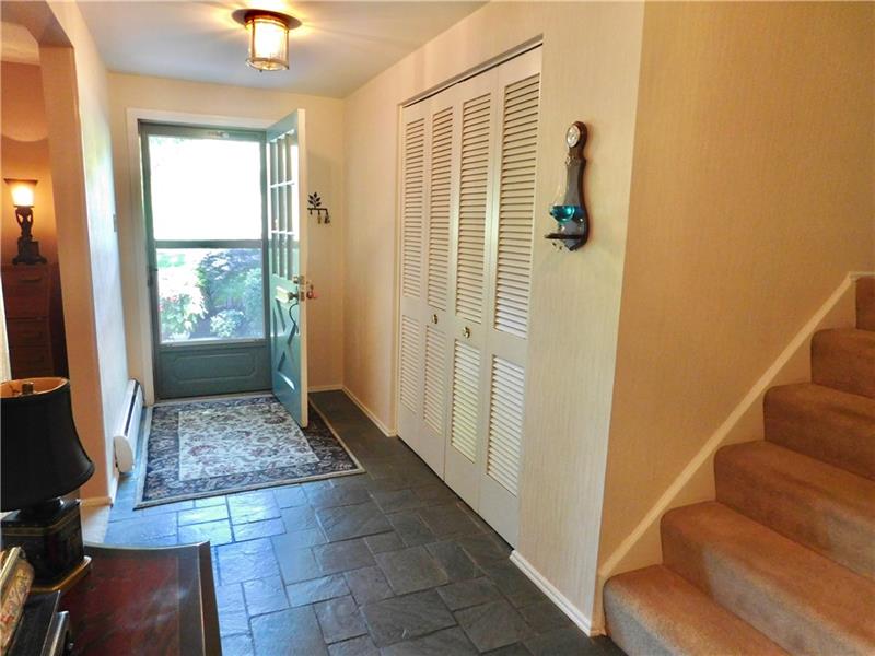 935 Ruth Street Pittsburgh, PA 15243 - Photo 3 of 25 Roomy foyer greets you and guests. Plenty of room for coats in the double closet.