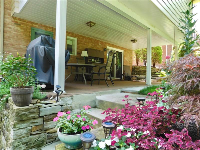 935 Ruth Street Pittsburgh, PA 15243 - Photo 24 of 25 Ahhh, time to relax on the back porch. You'll enjoy several months of the year in this serene and well maintained outdoor space.