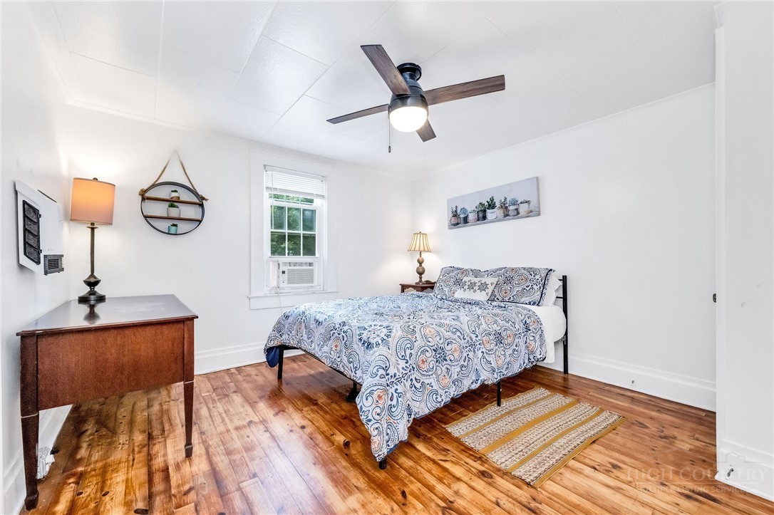 609 West Main Street Jefferson, NC 28640 - Photo 38 of 42 a bedroom with a bed and window