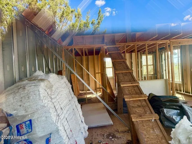 a view of a porch with seating space