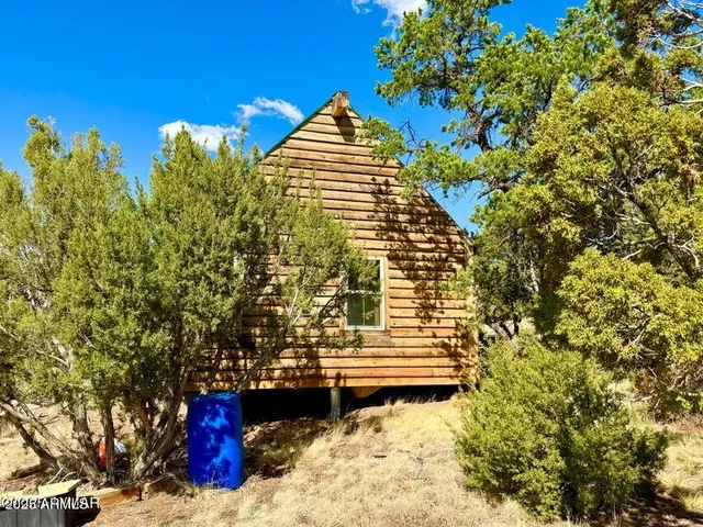a lobby with furniture and floor to ceiling window