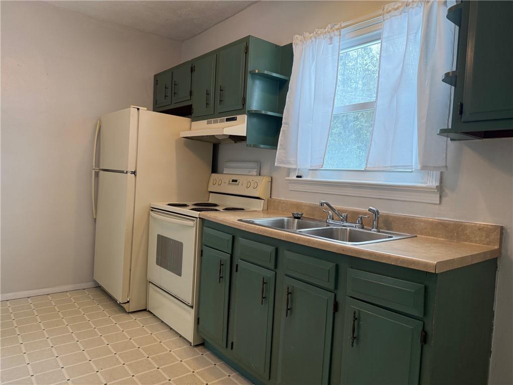 5708 Pontiac Drive Export, PA 15632 - Photo 4 of 29 a kitchen with a sink cabinets and stainless steel appliances