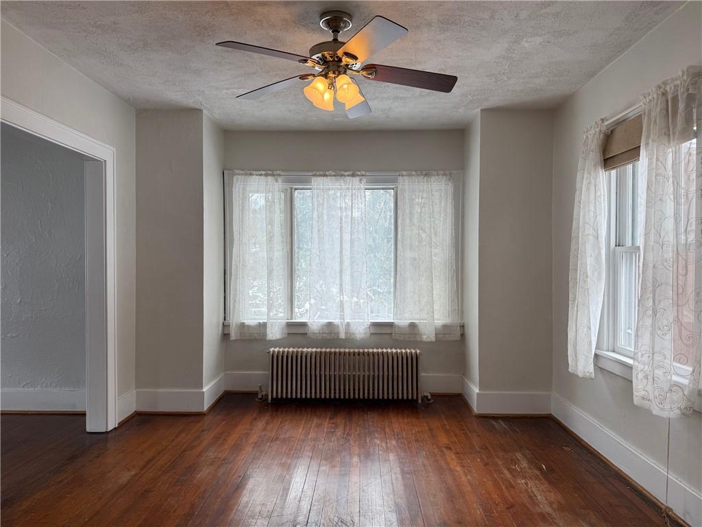 5708 Pontiac Drive Export, PA 15632 - Photo 7 of 29 a view of room with window and wooden floor