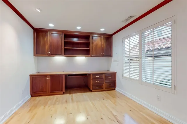 a kitchen with granite countertop a stove and a microwave oven