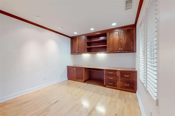 a bathroom with a sink a mirror and a shower