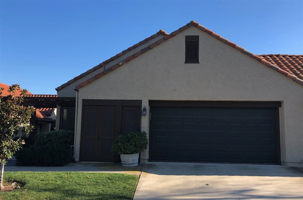 12211 Bajada Road San Diego, CA 92128 - Photo 22 of 23 a front view of house with yard