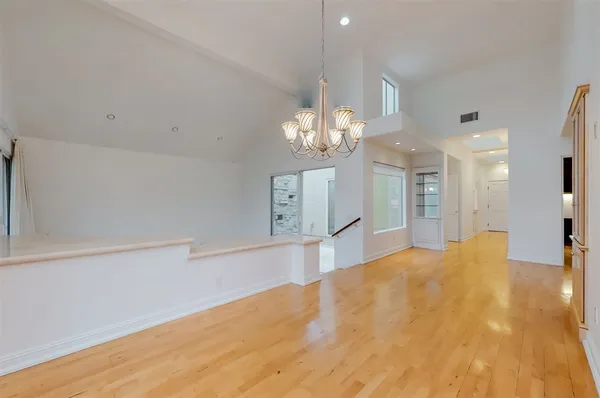 a view of a kitchen with furniture and a fireplace