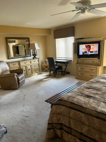 a room with furniture and a window