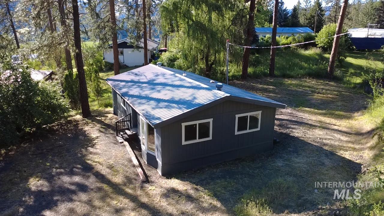 151 View Road Kamiah, ID 83536 - Photo 43 of 49 Single-story residence featuring dark gray siding and white-framed windows