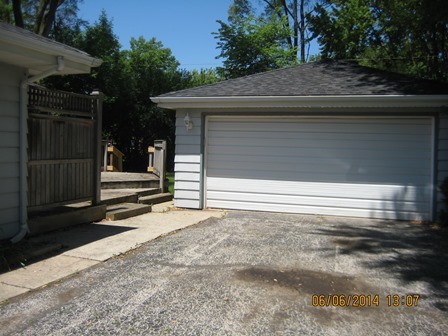 24 Northcrest Road Lake Zurich, IL 60047 - Photo 11 of 14 a house with trees in the background