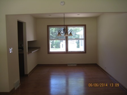 24 Northcrest Road Lake Zurich, IL 60047 - Photo 3 of 14 an empty room with wooden floor and windows