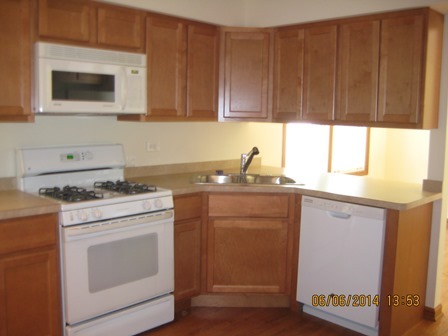 24 Northcrest Road Lake Zurich, IL 60047 - Photo 4 of 14 a kitchen with a stove microwave and sink