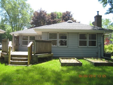 24 Northcrest Road Lake Zurich, IL 60047 - Photo 10 of 14 a front view of a house with a yard