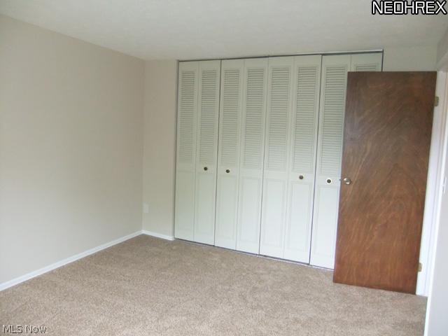 992 Hampton Ridge Drive Akron, OH 44313 - Photo 13 of 17 ...newer neutral carpet and walls and a spacious closet.