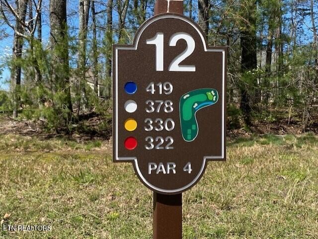 0 Mariners Point Crossville, TN 38558 - Photo 3 of 6 a sign broad on the side of the wall