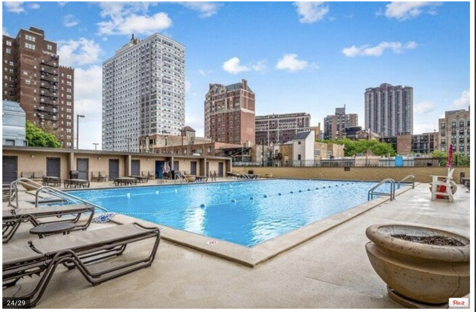 655 West Irving Park Road, Unit 4009 Chicago, IL 60613 - Photo 20 of 27 a view of swimming pool with outdoor seating and city view