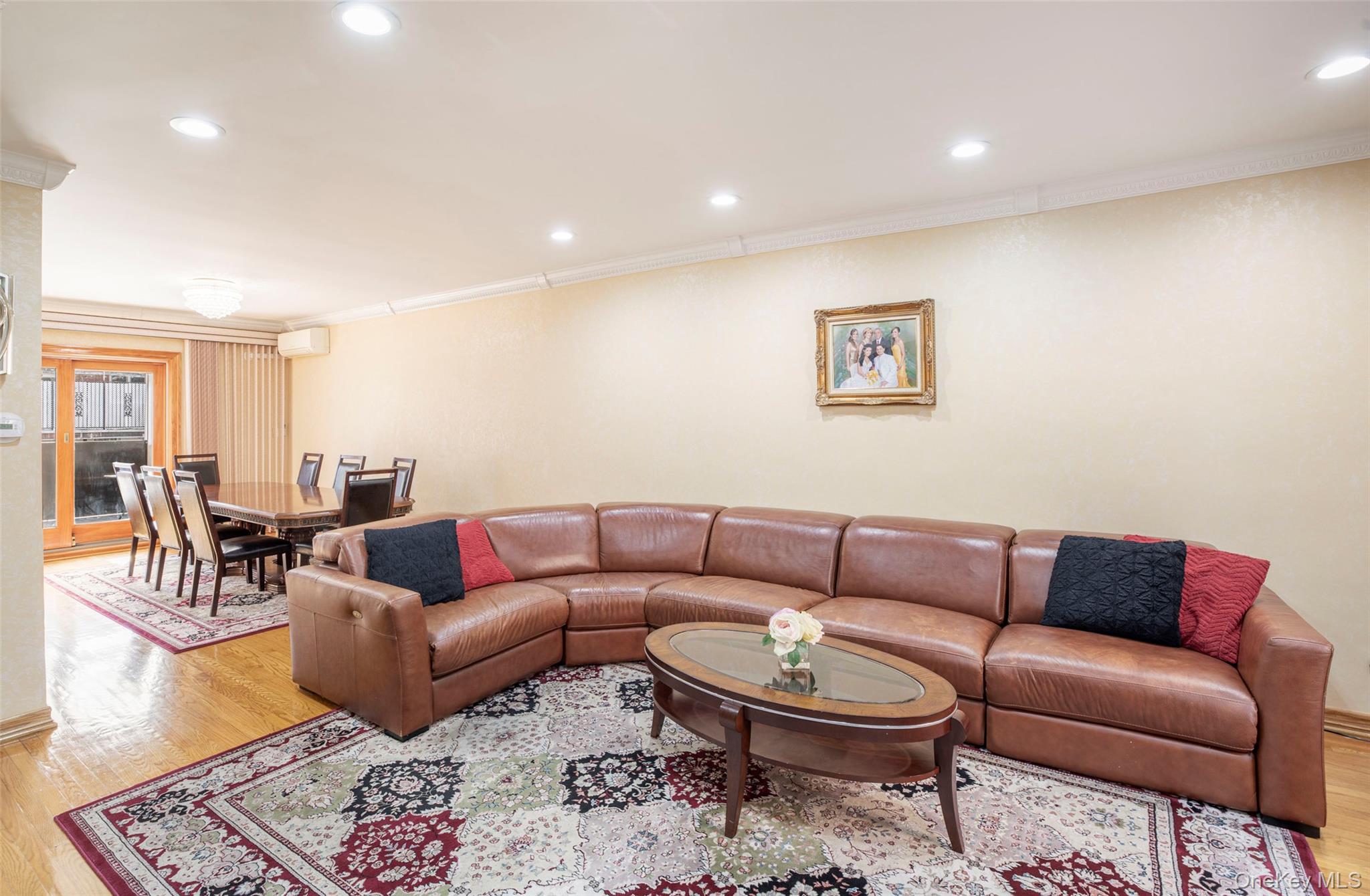 99-64 65th Avenue Queens, NY 11374 - Photo 2 of 22 a living room with furniture and a rug