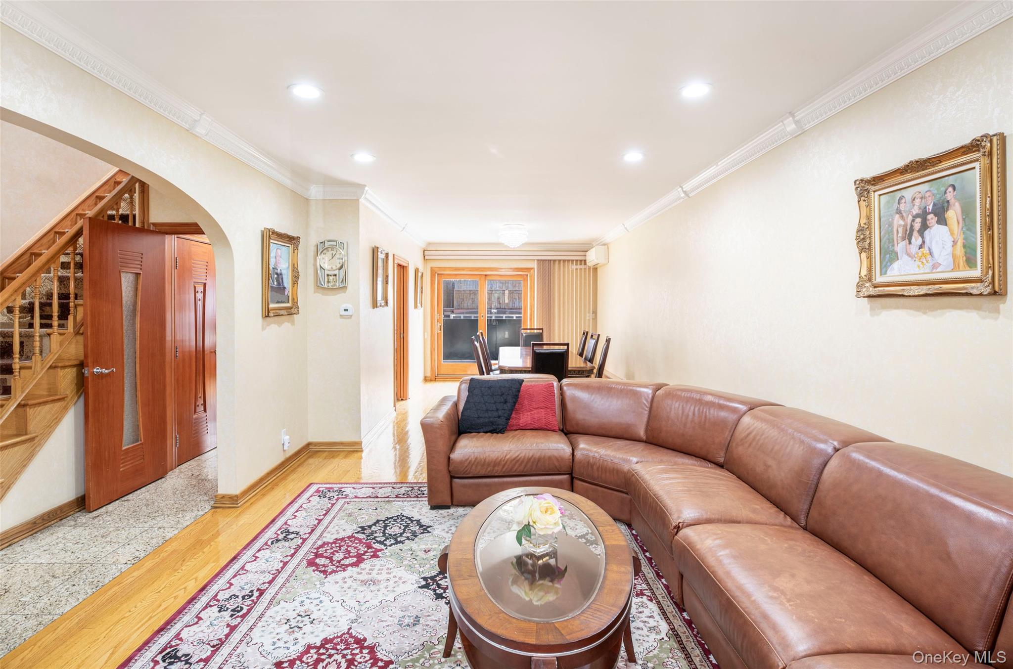 99-64 65th Avenue Queens, NY 11374 - Photo 4 of 22 a living room with furniture and a rug